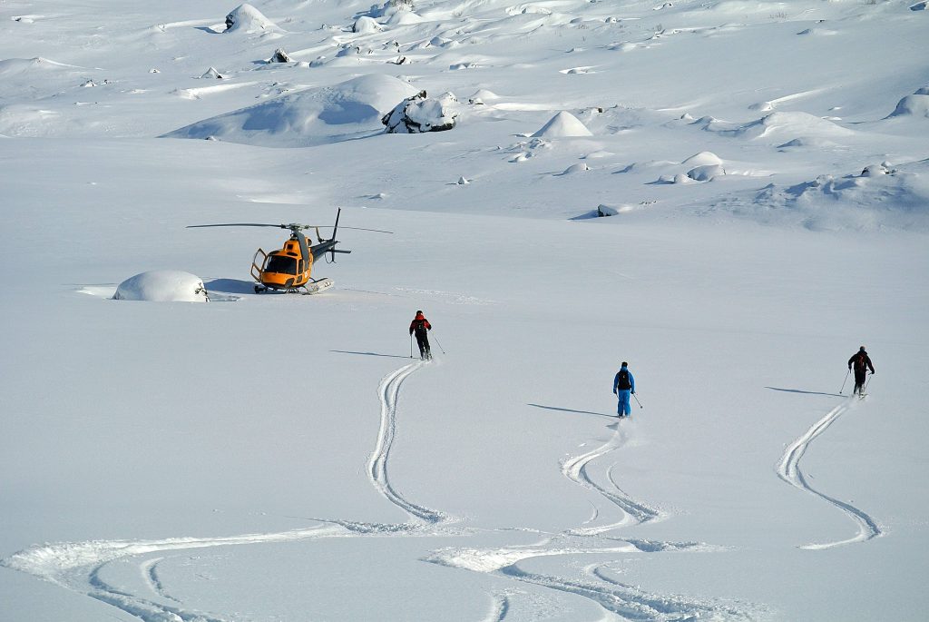 Private heli skiing - skiing to heli